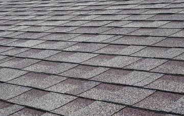 Pulley tiles for shallow pitch roofing